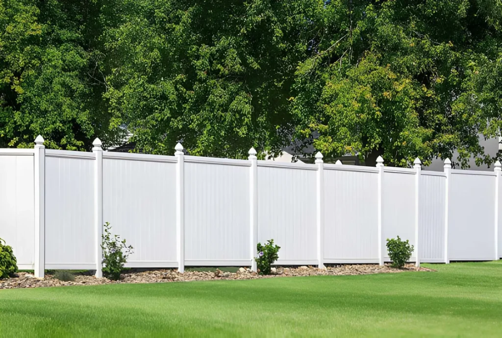 Vinyl Fence Installation for a residential backyard privacy fence