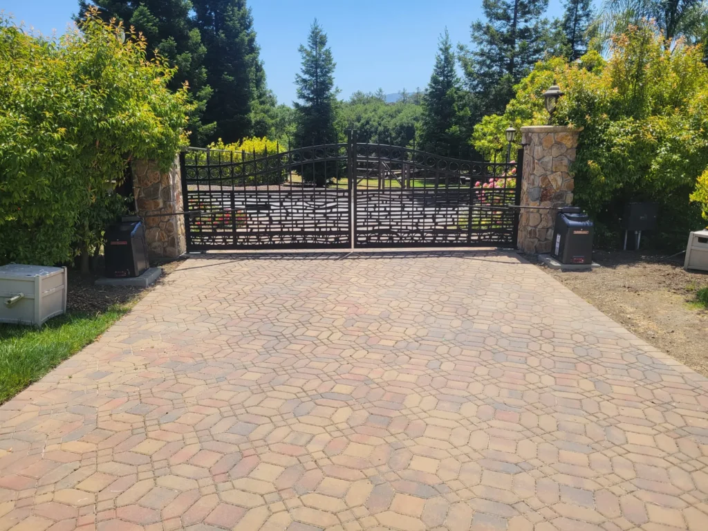 Driveway Gate Installation featuring a modern metal gate